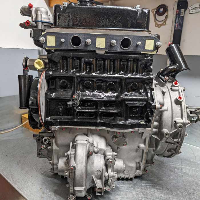 Classic Mini engine and gearbox power unit showing the shared oil system