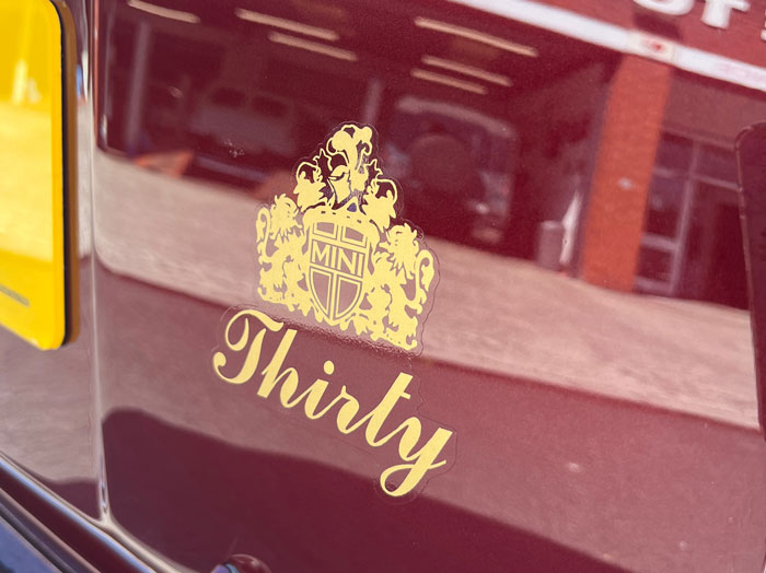 Correct Mini 30 decals and exterior details on the restored Cherry Red car