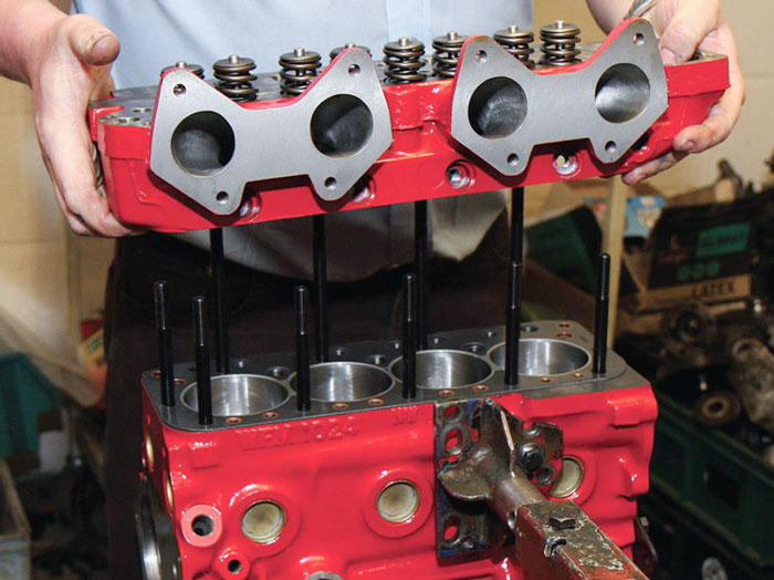 Mini Sport engine technician assembling a remanufactured Classic Mini A-Series engine