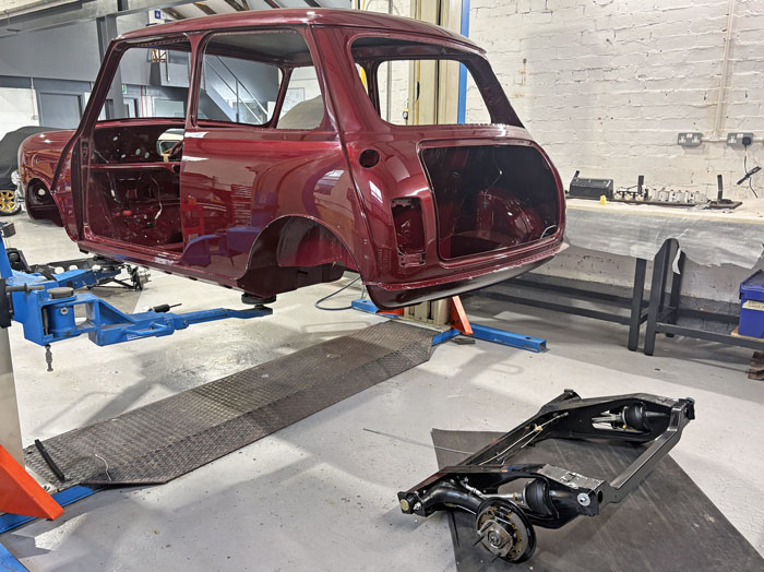 Cherry Red Mini 30 bodyshell installed onto rebuilt subframes